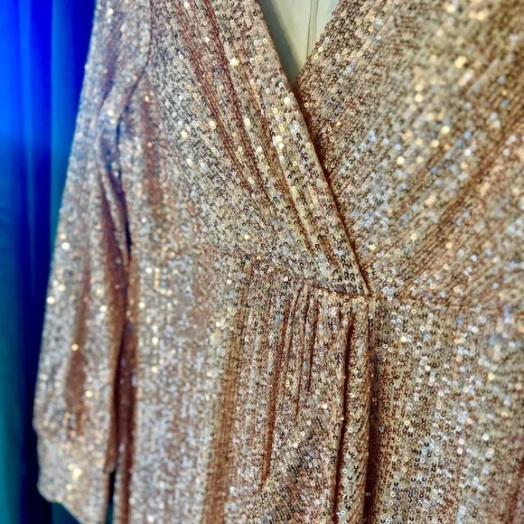 Stunning Mermaid Rose Gold Sequined Dress with Sleeves and Slit - Picture 12 of 16